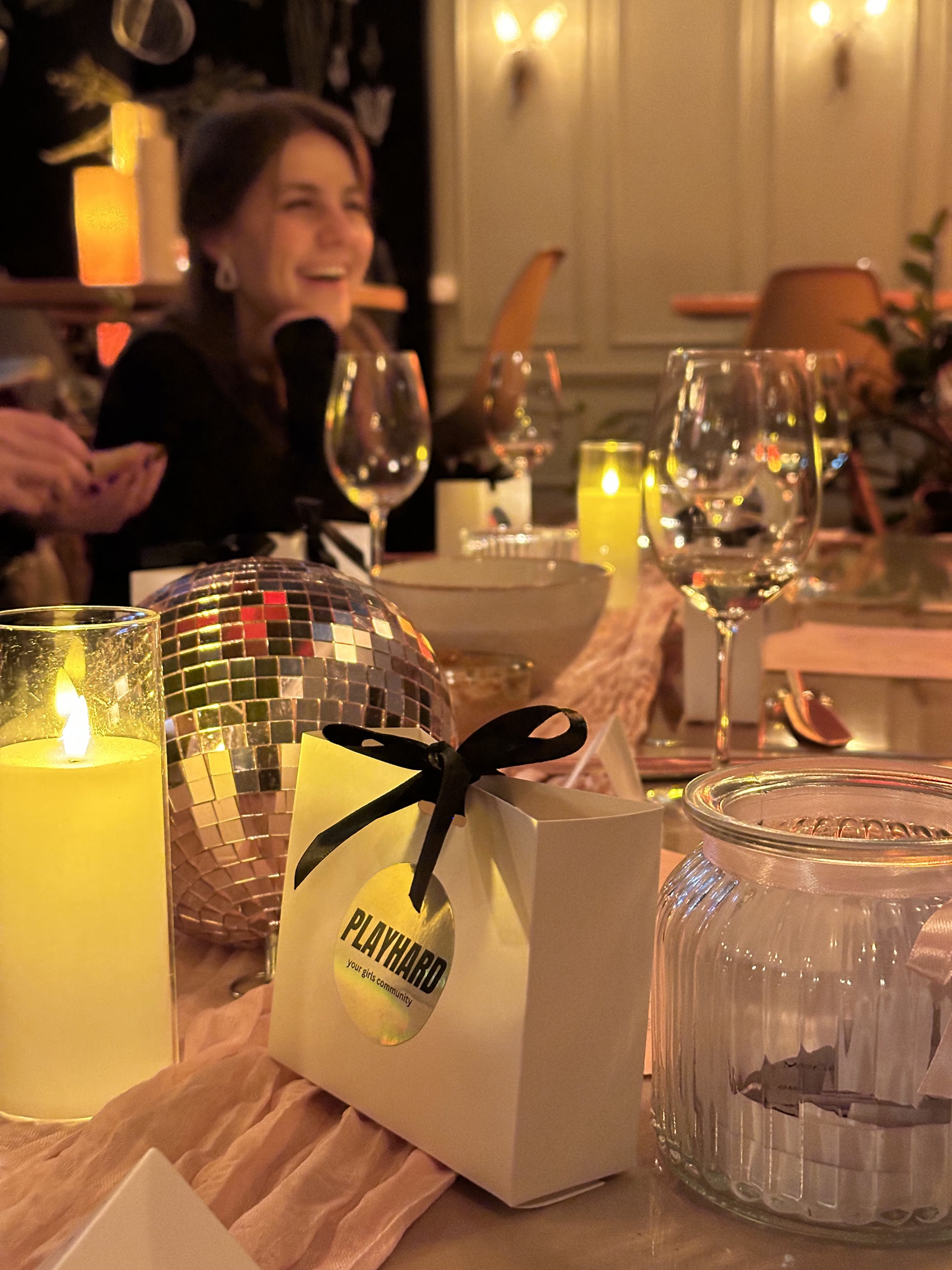 Candlelit Girls Night table with a Playhard gift bag