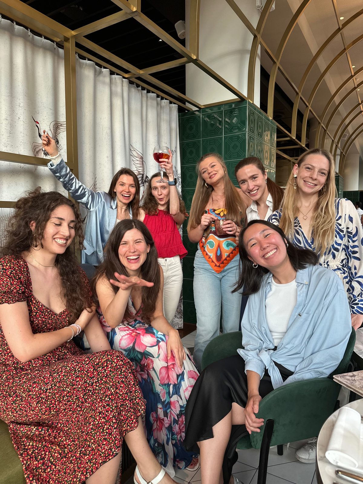 A dressed-up group of girls laughing together