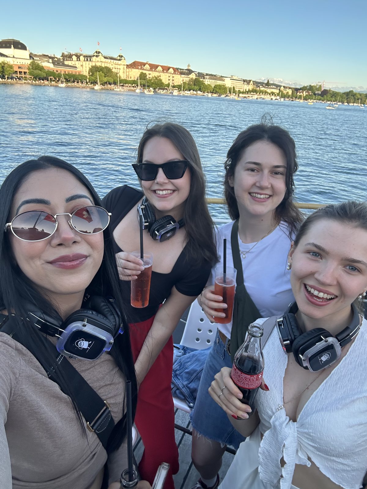 Girls on a boat at sunset