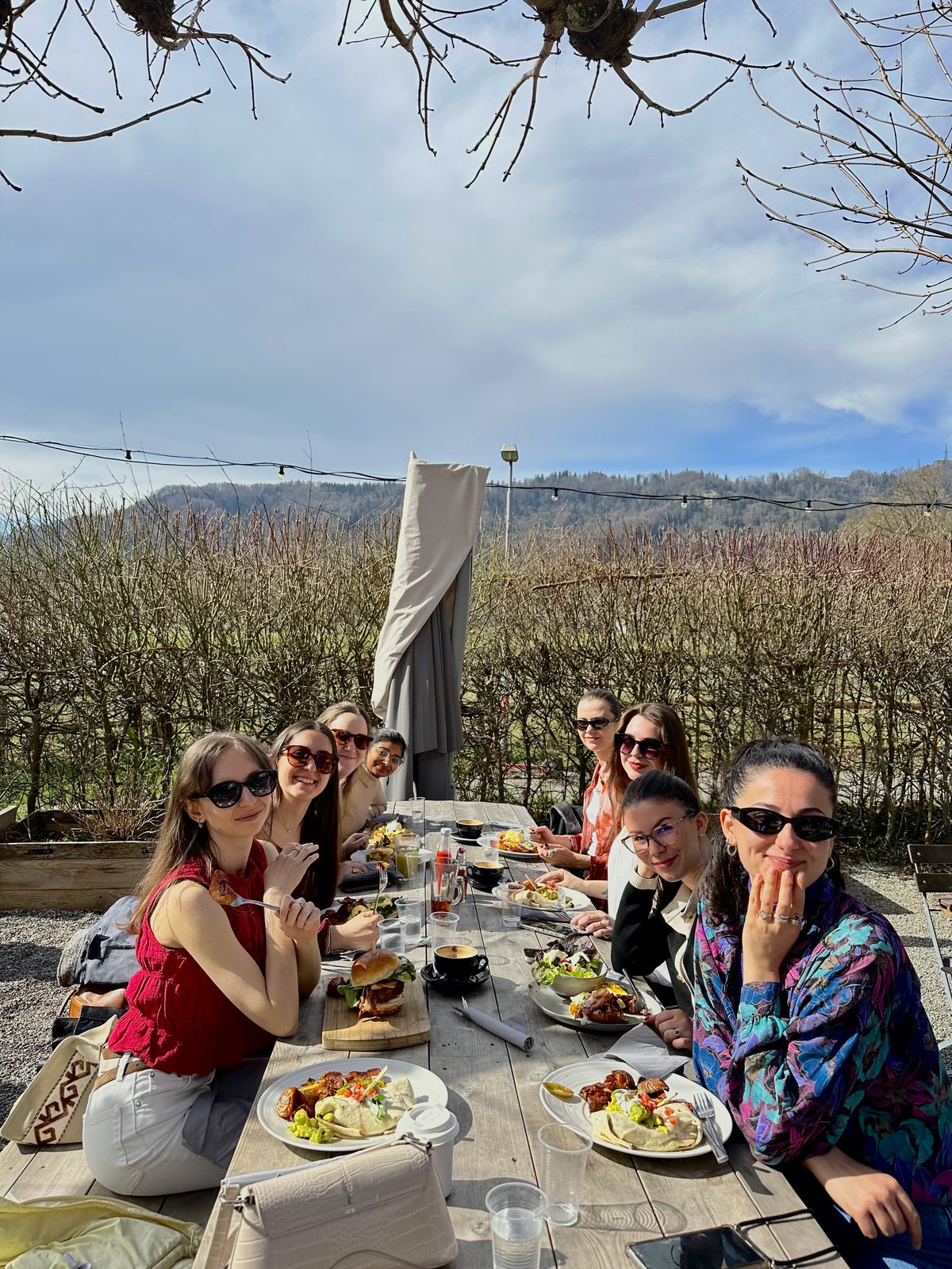 Girls at a sunny outdoor lunch